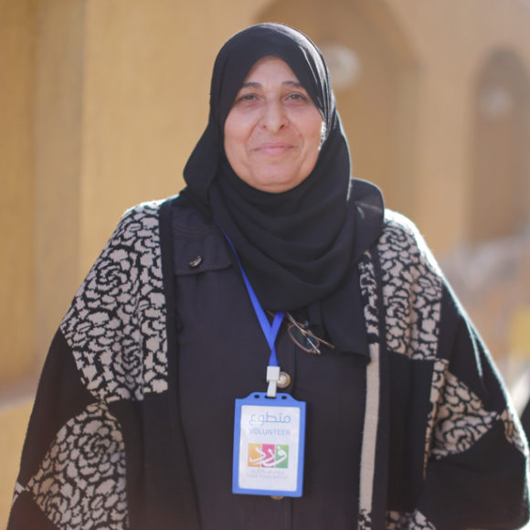The 55-Year-Old Syrian Refugee Defeating Stereotypes by Volunteering at the Same NGO that Helps Her